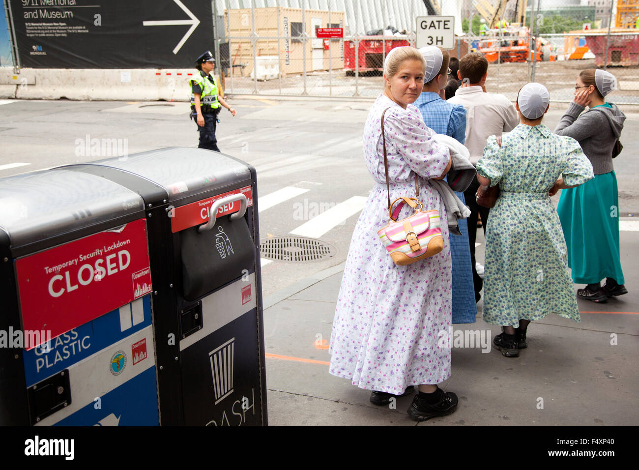 mennonite girls in traditionel dress on the street in new york city near ground zero Stock Photo