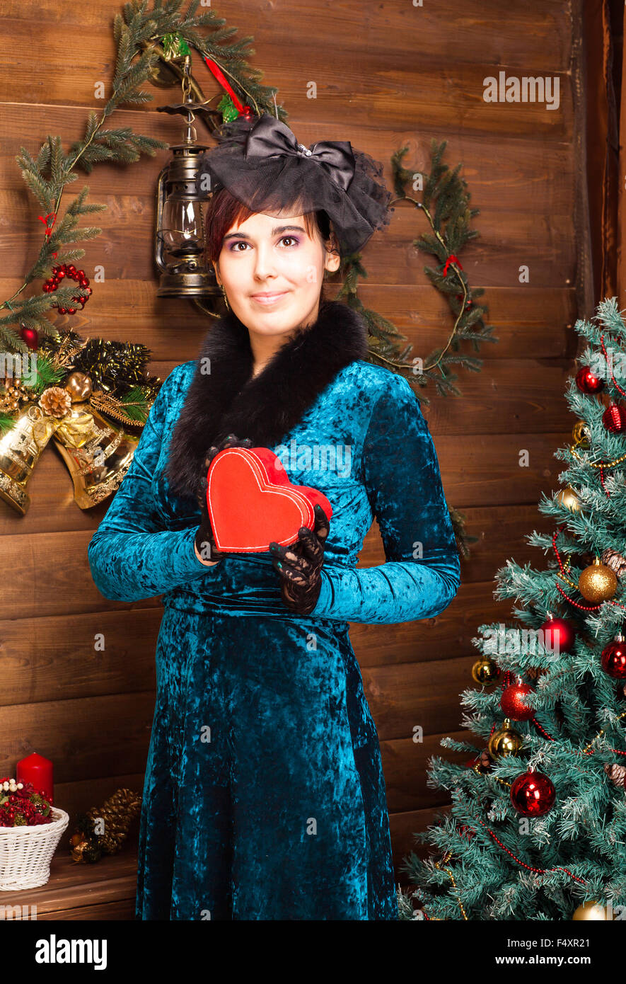 beautiful young woman with christmas gift Stock Photo - Alamy