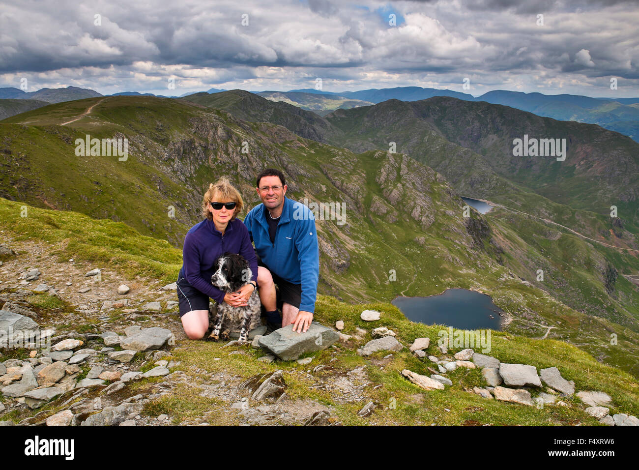 Coniston Old Man; Couple with Dog Cumbria; UK Stock Photo