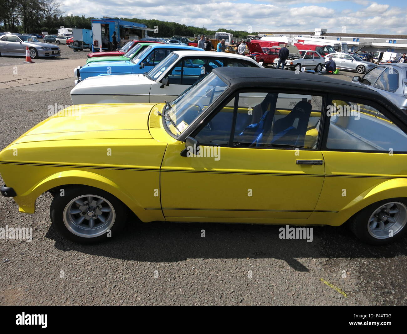 Ford Escort mk2 RS mexico - at donnington RSOC RS owners club event - showing yellow car with others in row Stock Photo