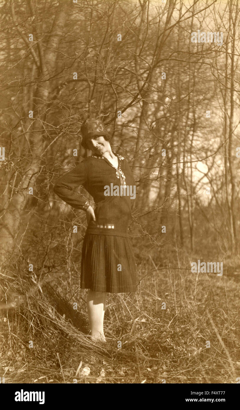 A woman with black dress in the woods, Denmark Stock Photo