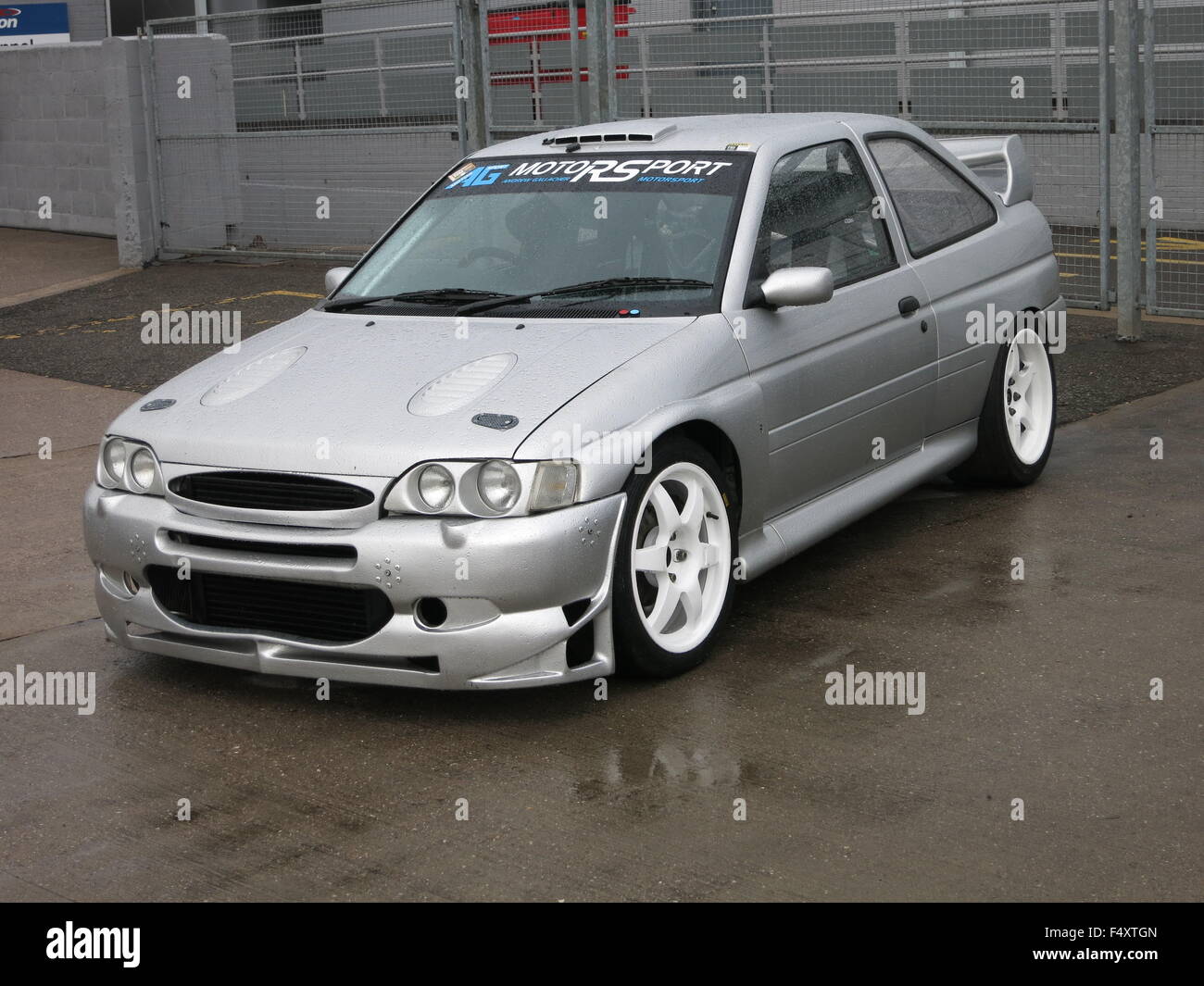 Ford Escort WRC World rally car - replica with full bodykit - in silver -  front and side view Stock Photo - Alamy
