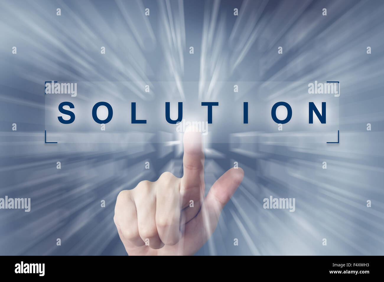 hand clicking on solution button with zoom effect background Stock Photo