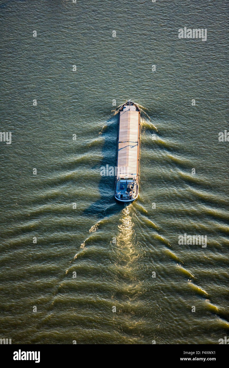 Cargo ships, container barges and container ships on Rhine, inland shipping, Rheinhausen, Duisburg, Ruhr district Stock Photo