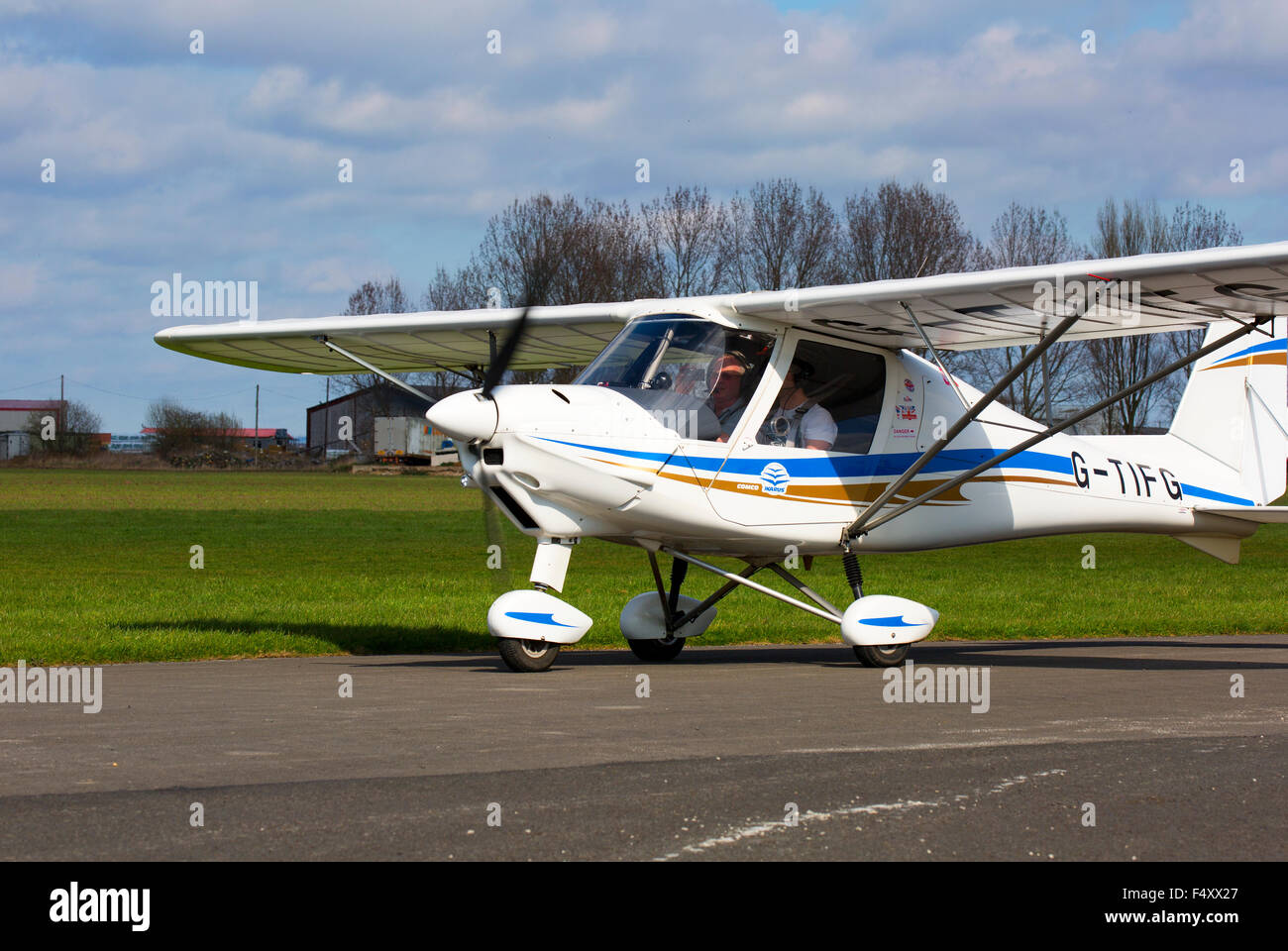 Ikarus C42 FB80 G-TIFG taxiing to runway at Breighton Airfield Stock Photo