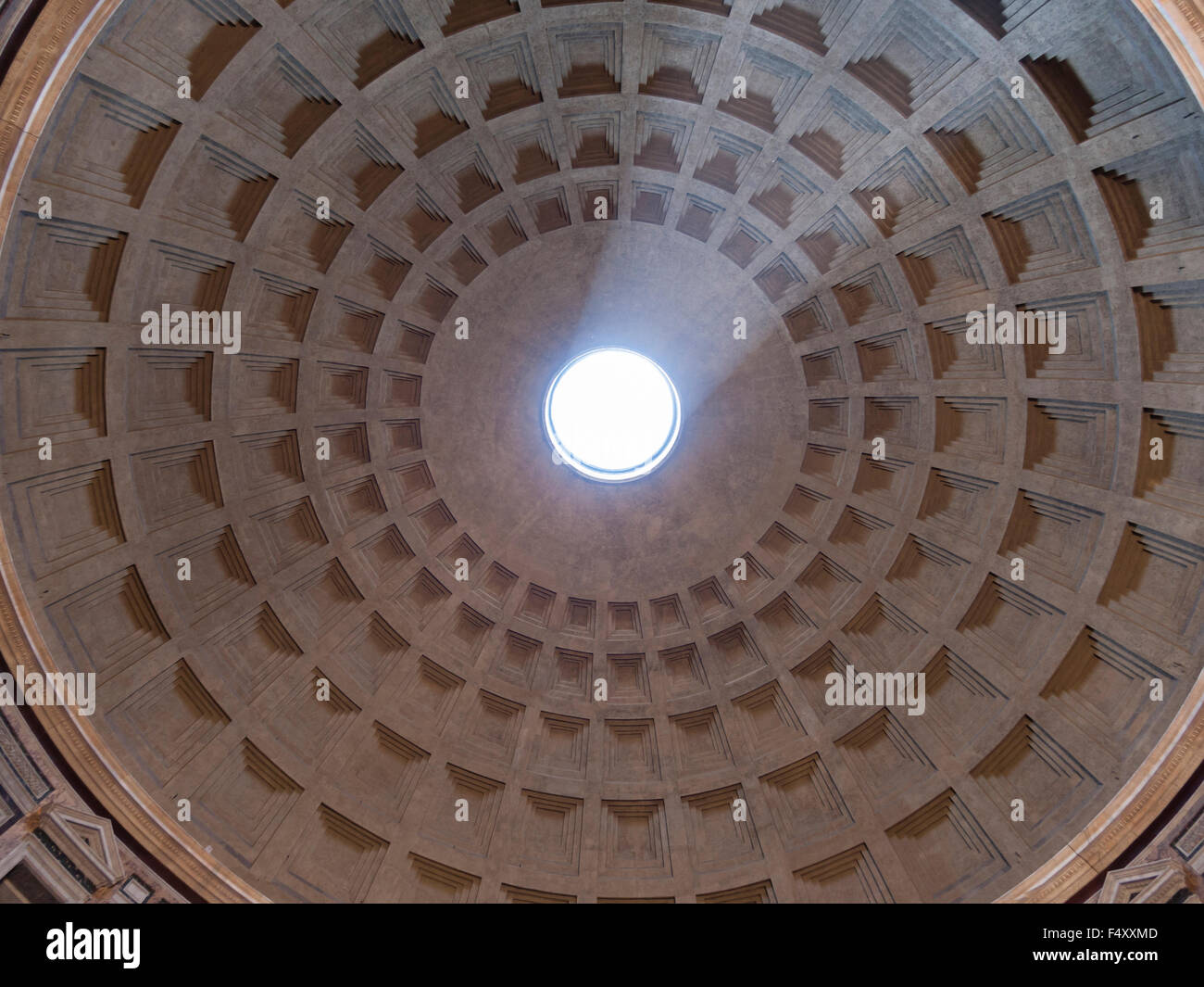 Sunlight is shining into the ancient Roman Pantheon temple through the