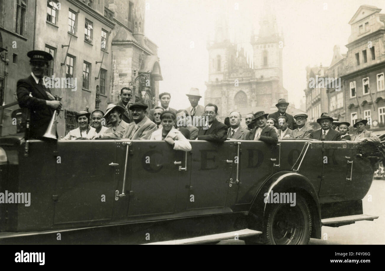 A group on a long car convertible in Prague, Czech Republic Stock Photo