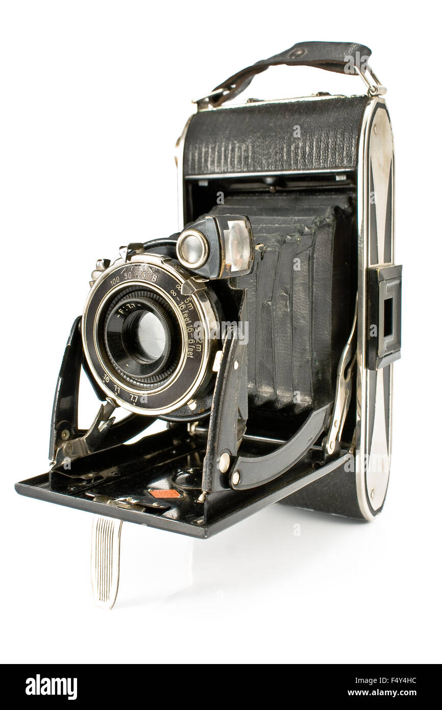 Antique Old photo Camera isolated on white Stock Photo