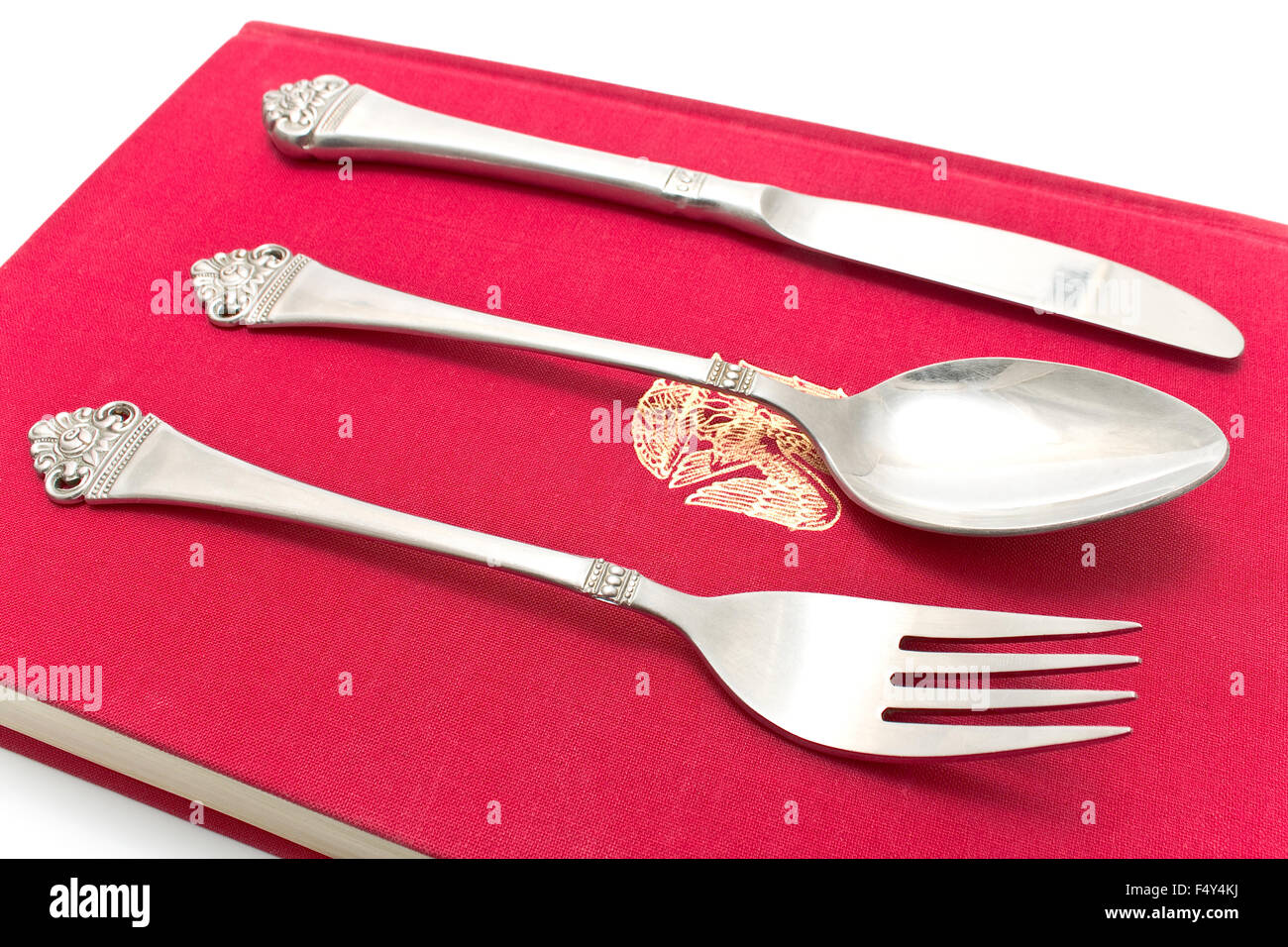 Cutlery set with Fork, Knife and Spoon on red Stock Photo Alamy