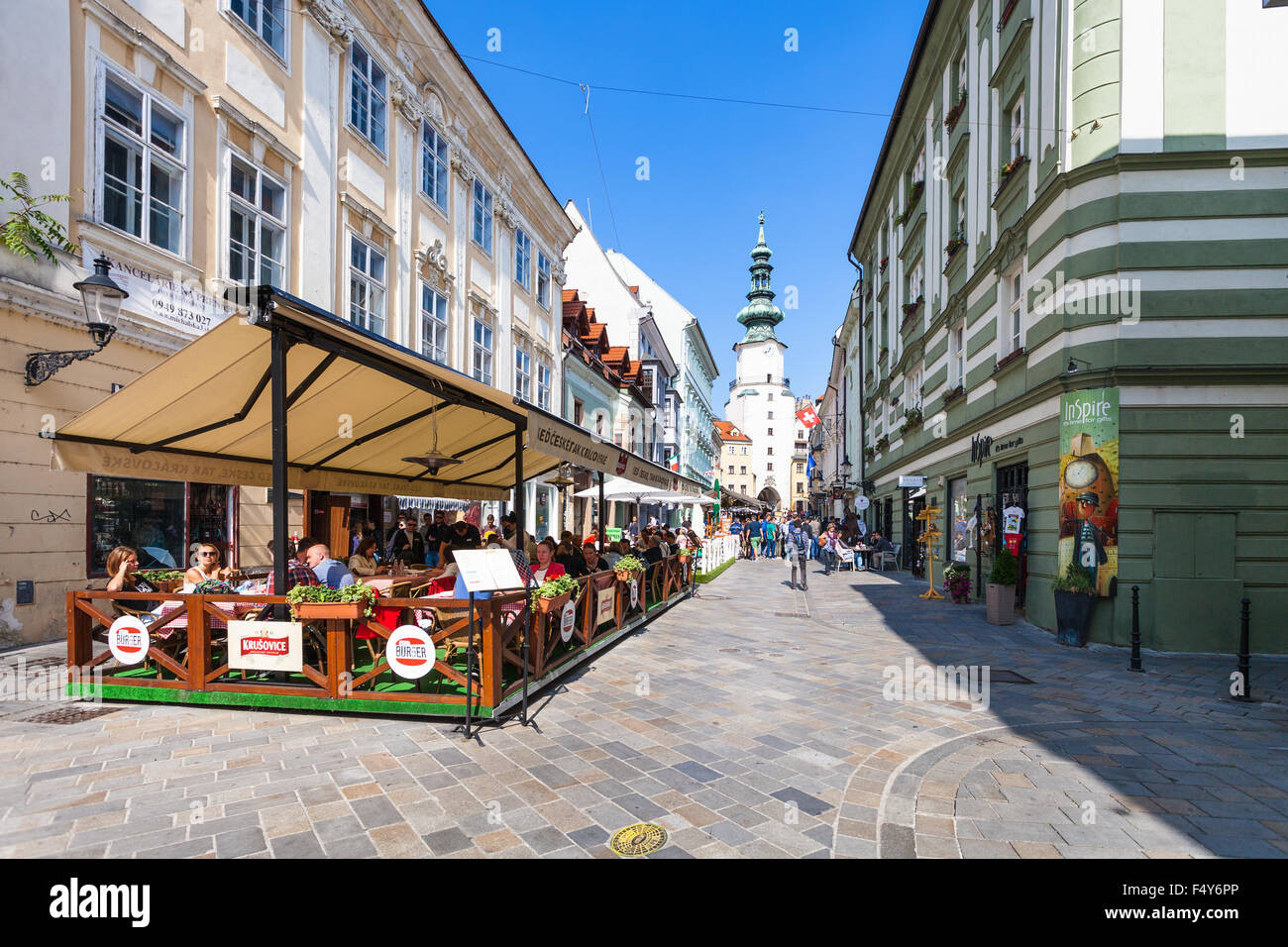 BRATISLAVA, SLOVAKIA - SEPTEMBER 23, 2015: tourists in restaurants on Michalska street in Bratislava. In Middle Ages this street Stock Photo