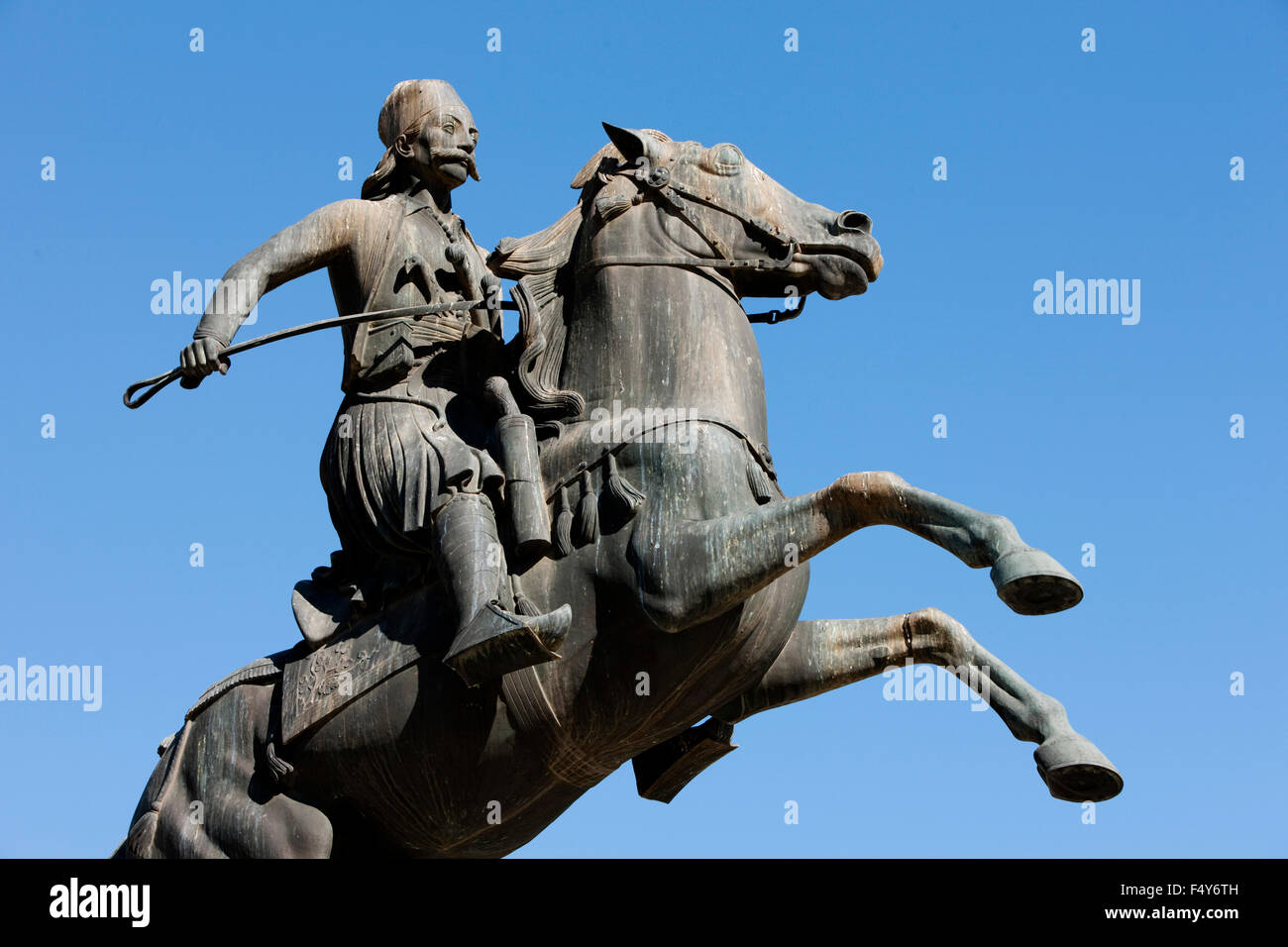 Side view closeup of Greek General army commander Georgios Karaiskakis riding his horse scuplture in Athens, Greece Stock Photo
