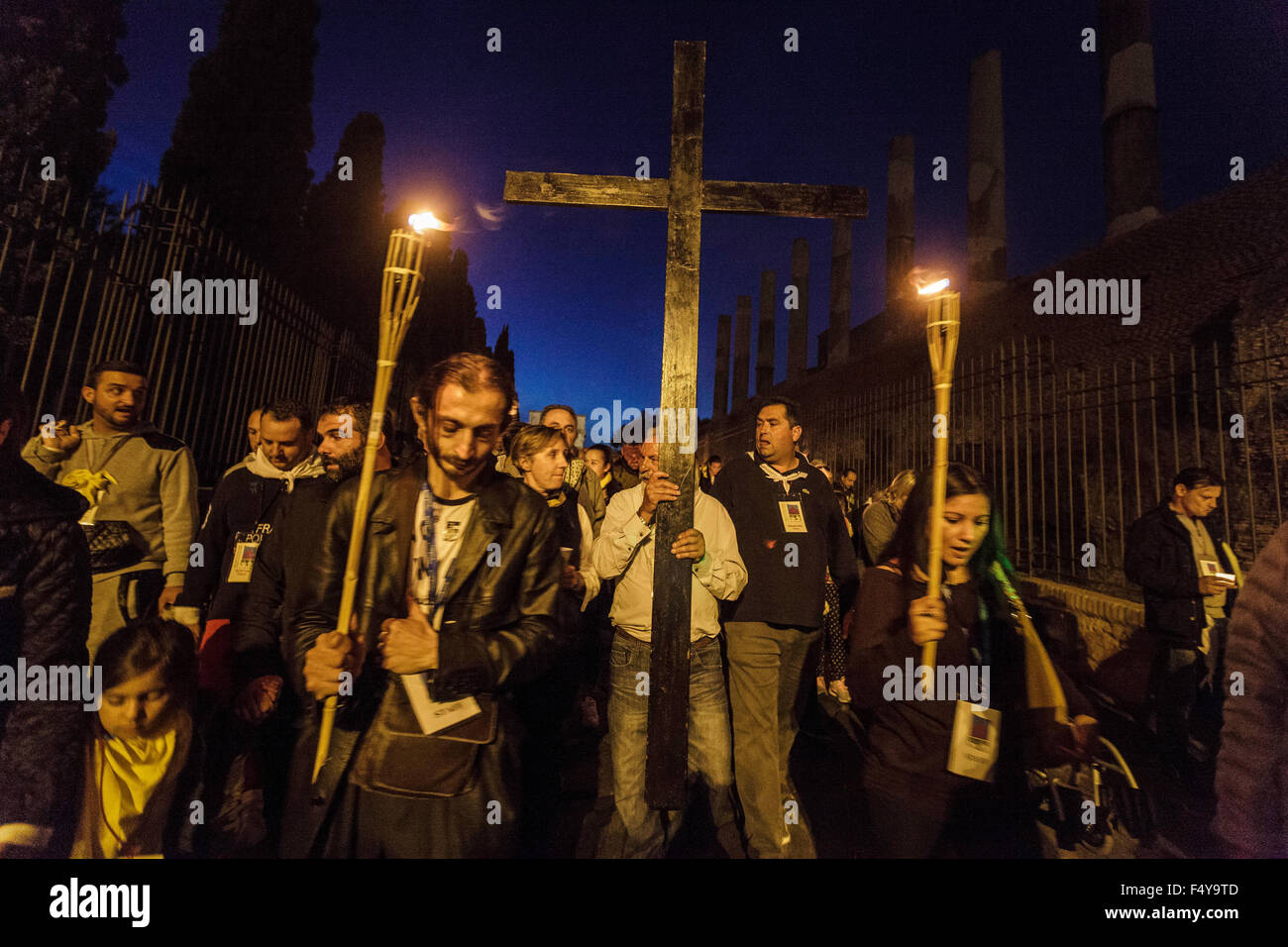 Rome, Italy. 24th Oct, 2015. Thousands of Gypsies (Rom, Sinti and travelers) attend celebrations of the Via Crucis outside the Colosseum in Rome, to mark the 50th anniversary of the historic visit of Pope Paul VI to the Pomezia camp in 1965. Credit:  Giuseppe Ciccia/Pacific Press/Alamy Live News Stock Photo