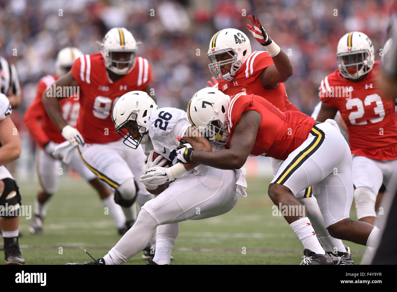 Baltimore, Maryland, USA. 24th Oct, 2015. Penn State Nittany Lions running back SAQUON BARKELY (26) is tackled by Maryland Terrapins defensive lineman YANNICK NGAKOUE (7) during the Big 10 conference football game at M&T Bank Stadium in Baltimore, MD Credit:  Ken Inness/ZUMA Wire/Alamy Live News Stock Photo