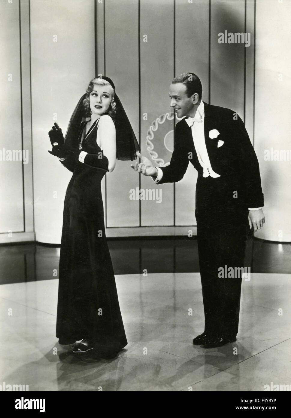 American actors Fred Astaire and Ginger Rogers in a scene from the movie 'Shall We Dance' USA 1937 Stock Photo