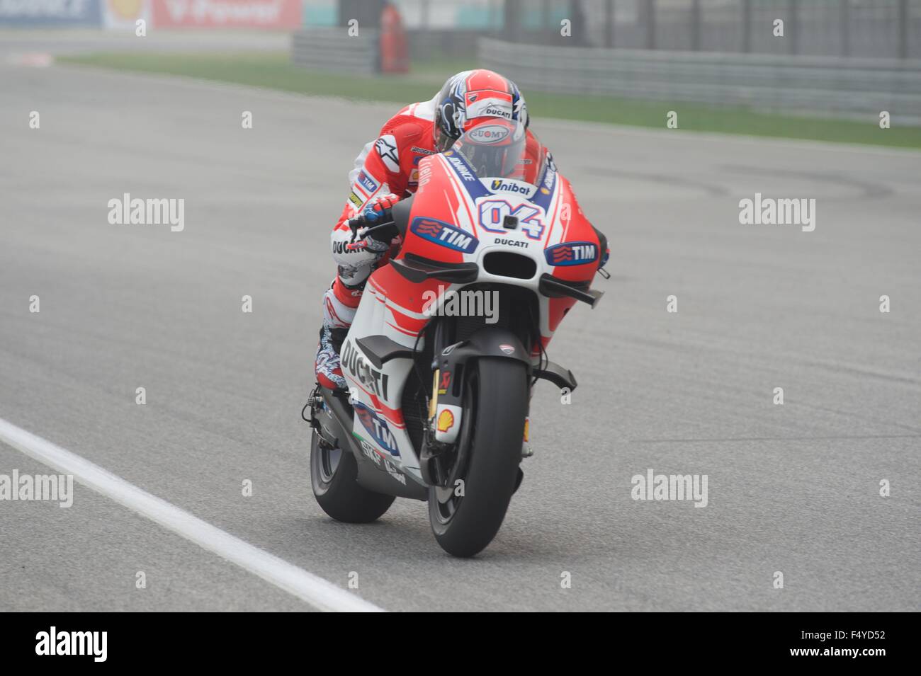 Sepang Circuit, Malaysia. 24th  Oct, 2015. Andrea Dovizioso on his Ducati GP15 bike during qualifying for the Shell Malaysia Motorcycle Grand Prix at Sepang Circuit. Stock Photo