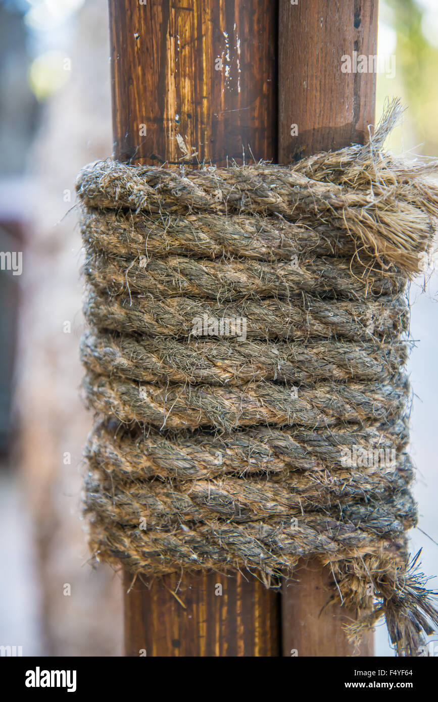 Hemp rope wrapped around the rods to seized the rods to the pole Stock