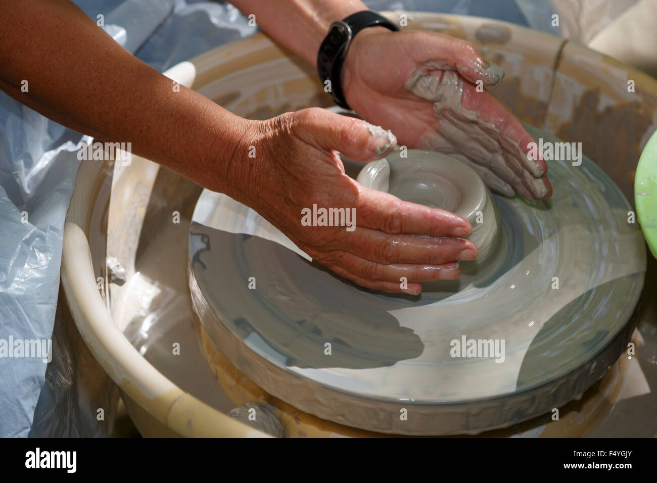 Pottery wheel hands hires stock photography and images Alamy
