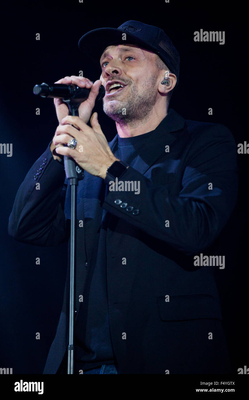 Turin, Italy. 24th Oct, 2015. Italian singer Max Pezzali performed live at the Pala Alpitour with the first of two consecutive dates of his 'Astronave Max Tour 2015'. The audience sang his greatest hits full of energy. Credit:  Elena Aquila/Pacific Press/Alamy Live News Stock Photo