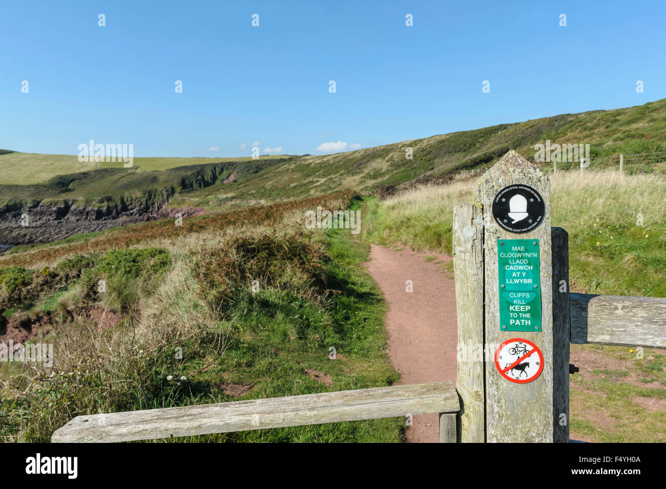 Signpost for the Pembrokeshire coast path. National park footpath sign.Trail. Stock Photo