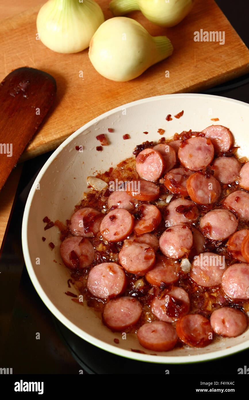 Frying Sliced Sausage Stock Photo Alamy