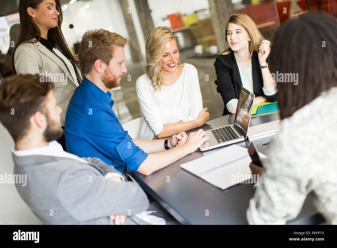 Young people in the office Stock Photo - Alamy