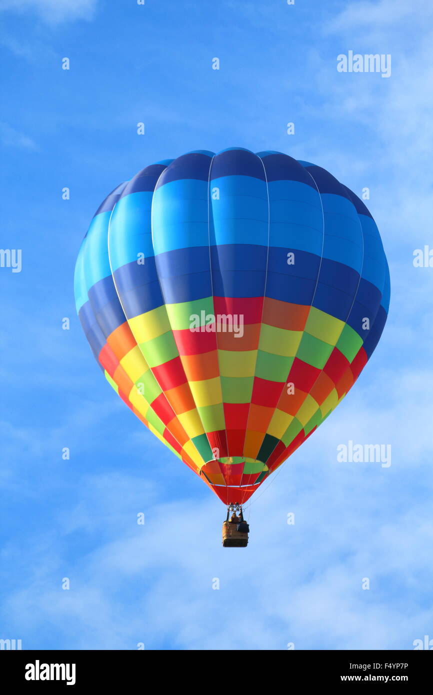 Brightly colored hot air balloon with a sky blue background Stock Photo ...