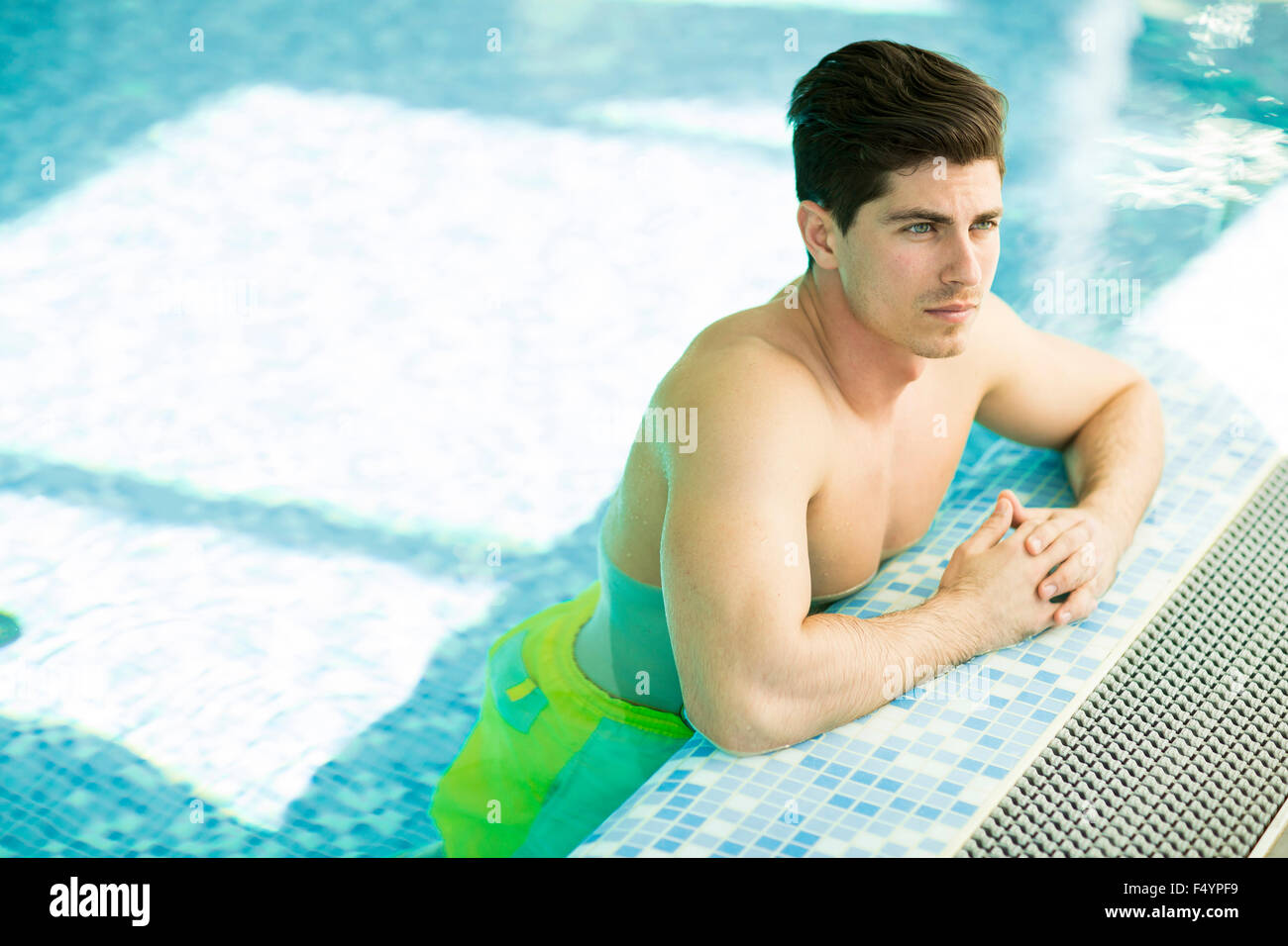 Young man in the swimming pool Stock Photo - Alamy