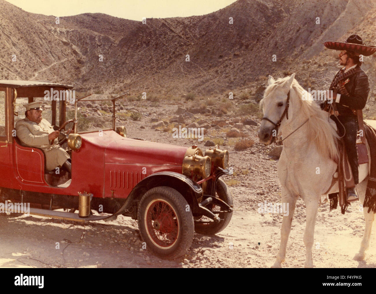Scene of a film is not identified with a red car early twentieth century Stock Photo