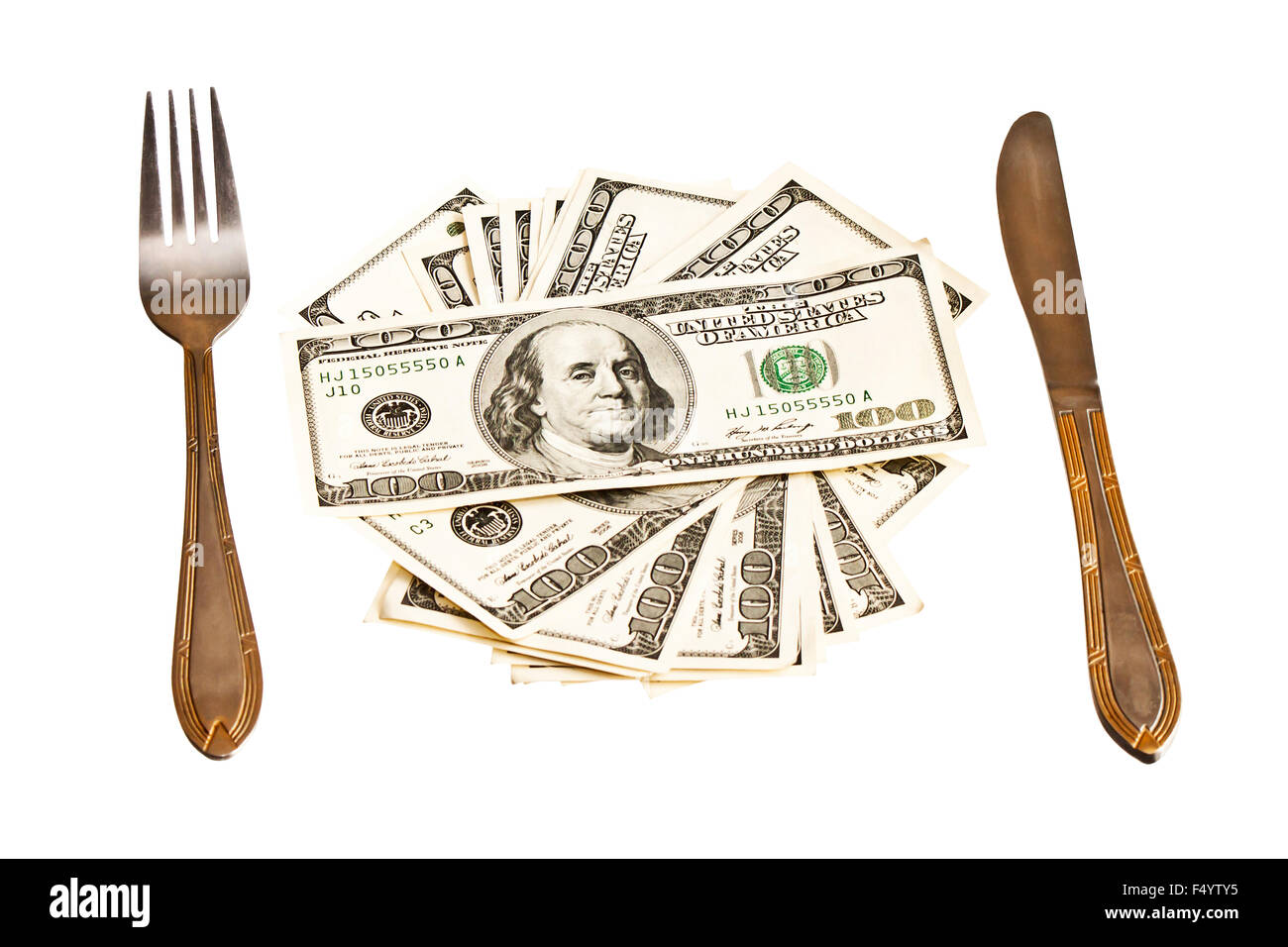 Money on the plate with fork and knife, isolated on white background