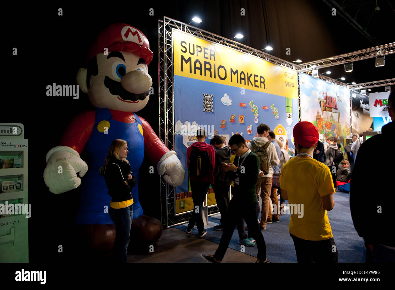 Warsaw, Poland. 24th Oct, 2015. Trade fair show Mario stand at games expo, Super Mario Maker figure at Warsaw Games Week, Targi Gier Wideo, Hala Expo XXI, Warsaw, Poland, October 24, 2015, horizontal orientation, rights managed, editorial use only. Credit:  Arletta Cwalina/Alamy Live News Stock Photo