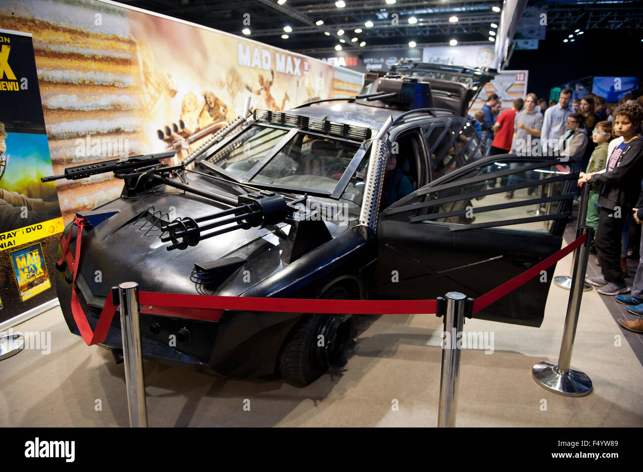Warsaw, Poland. 24th Oct, 2015. Trade fair show Mad Max car at games expo, Warsaw Games Week, Targi Gier Wideo, Hala Expo XXI, Warsaw, Poland, October 24, 2015, horizontal orientation, rights managed, editorial use only. Credit:  Arletta Cwalina/Alamy Live News Stock Photo
