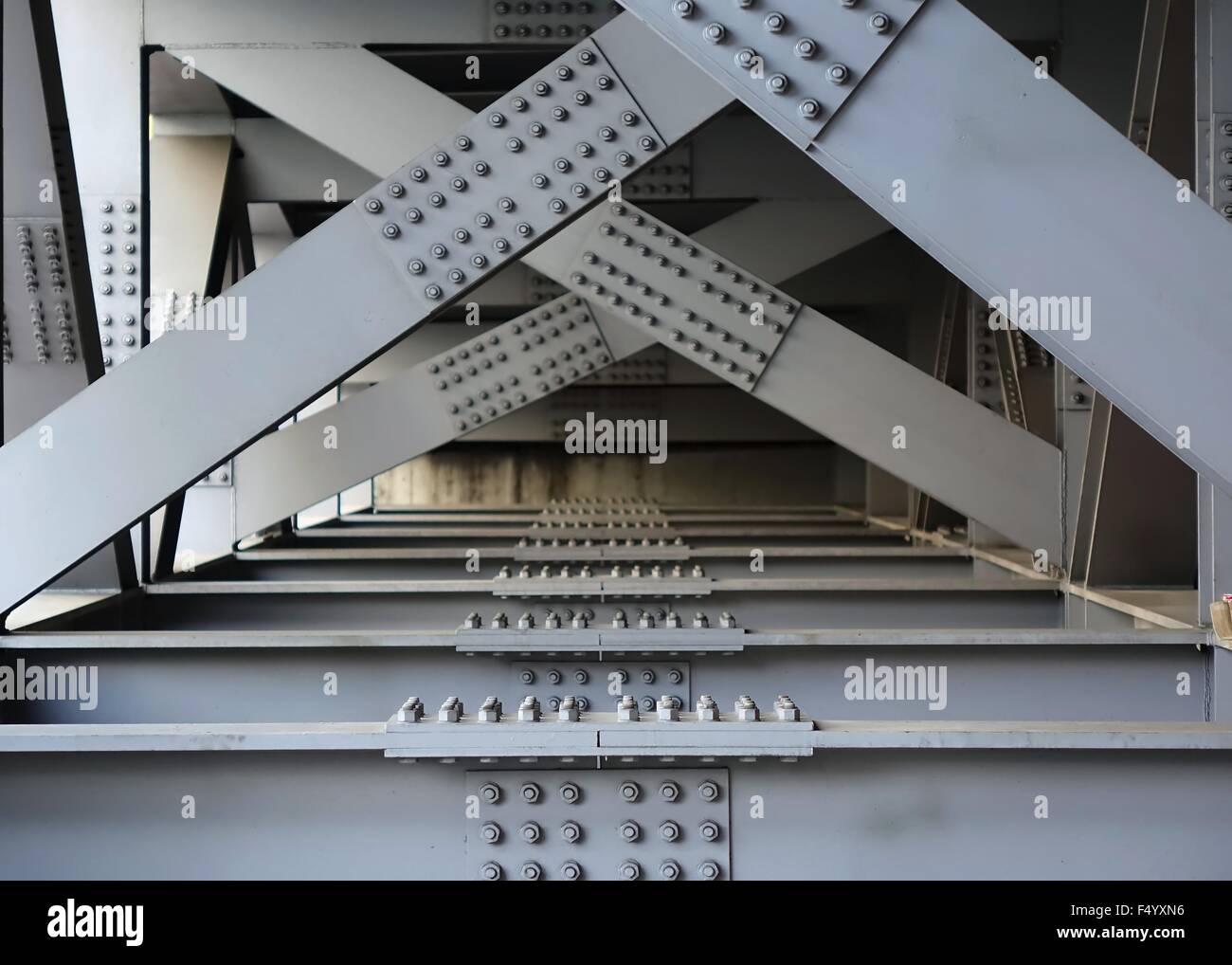 The underside of a bridge with large steel girders, bolts and nuts Stock Photo Alamy