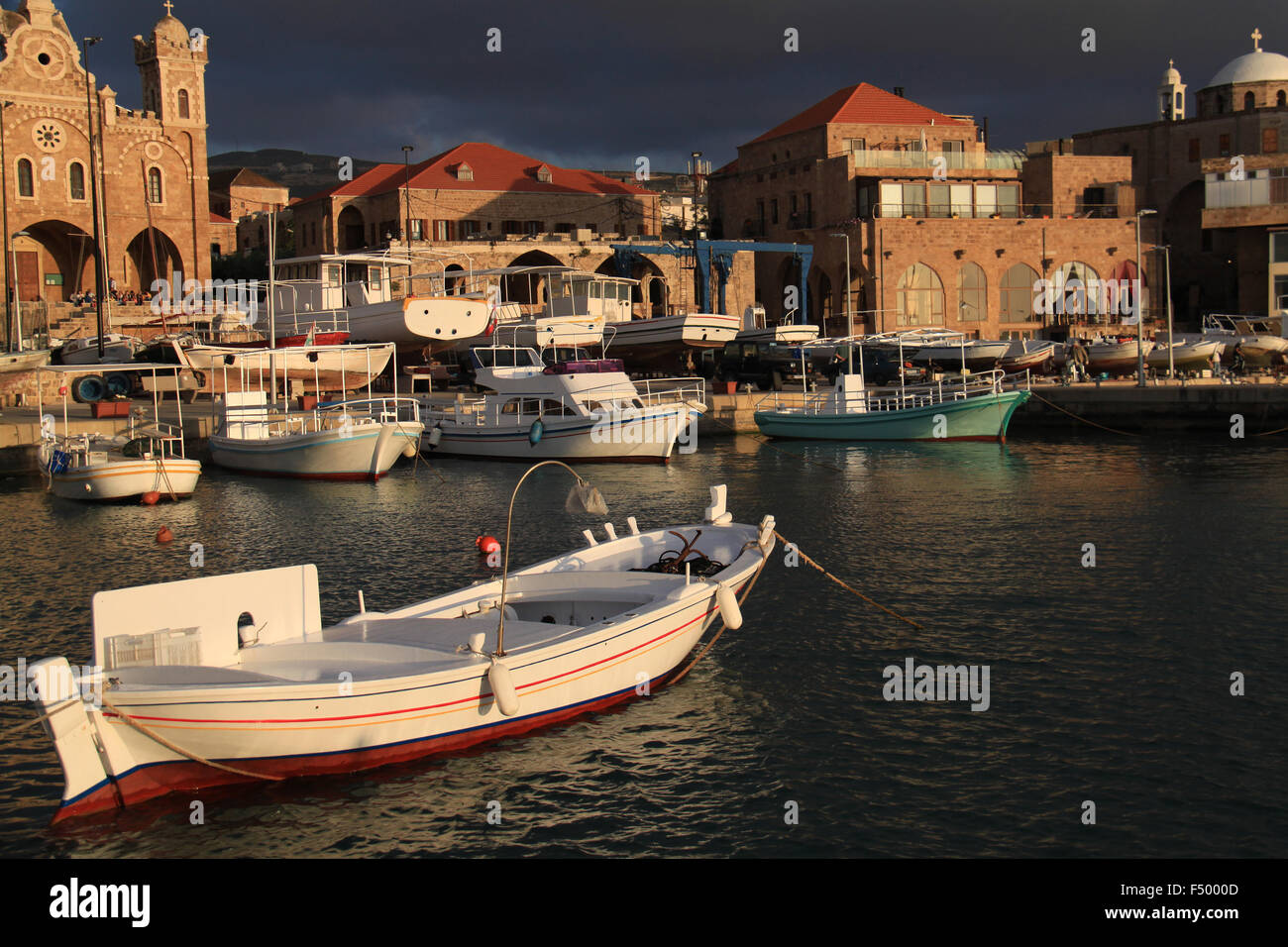 A view of the Batroun's fishing port, a Lebanese coastal town, in the afternoon. Stock Photo