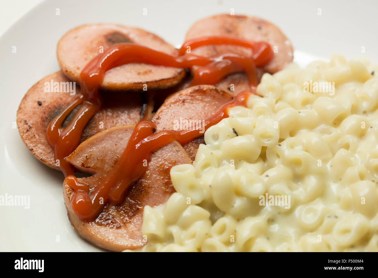 Swedish Falukorv sausage with stewed macaronis Stock Photo