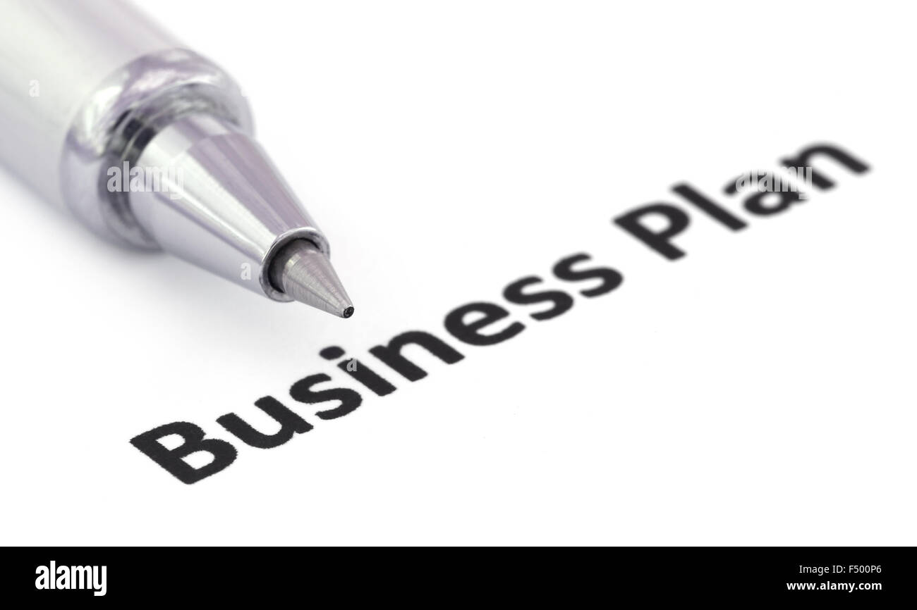 Business Plan written in a paper and a ballpoint Stock Photo