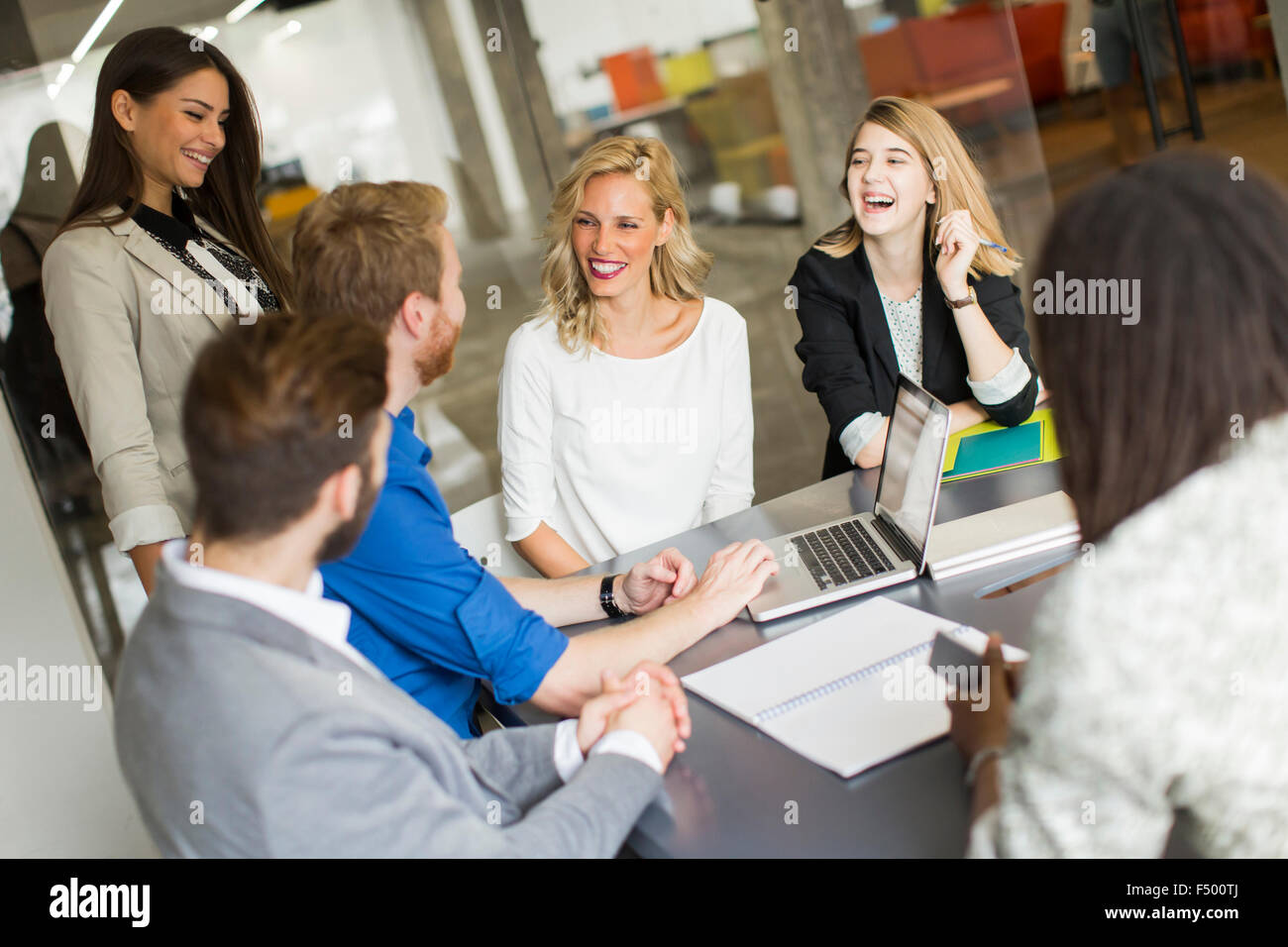 Young people in the office Stock Photo - Alamy