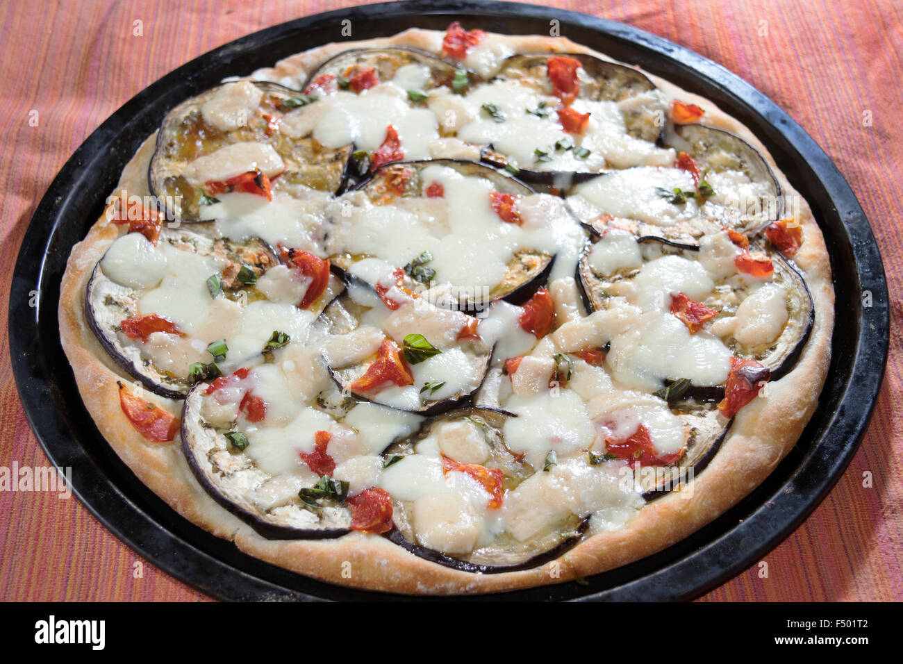 parmigiana pizza with eggplants parmesan cheese and mozzarella Stock Photo