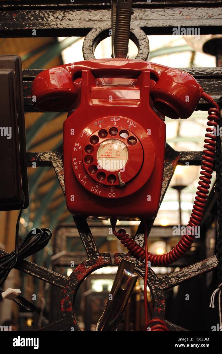 Red telephone on sale in  Convent  Gardens, London, UK Stock Photo