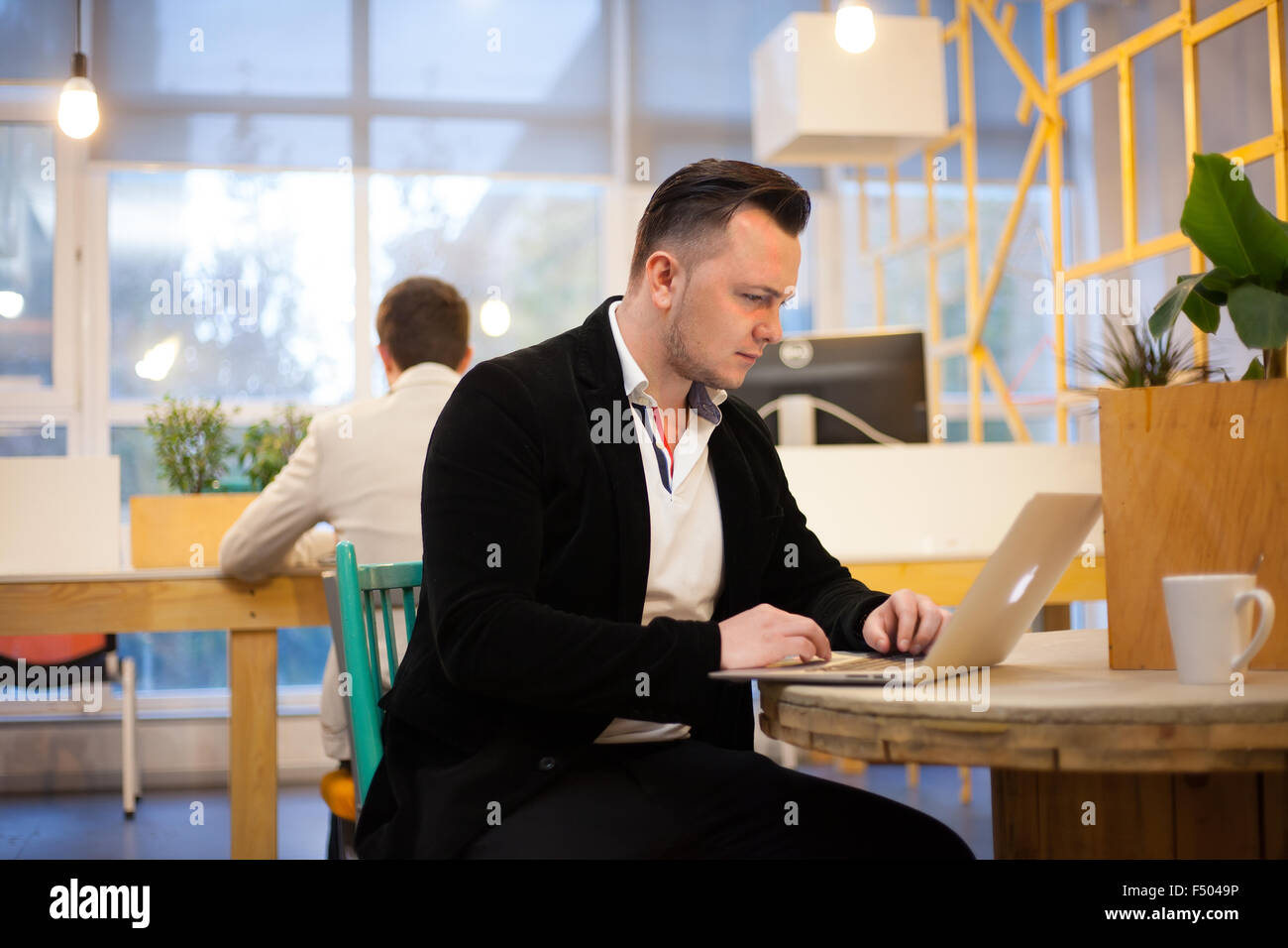 Coder working in office Stock Photo