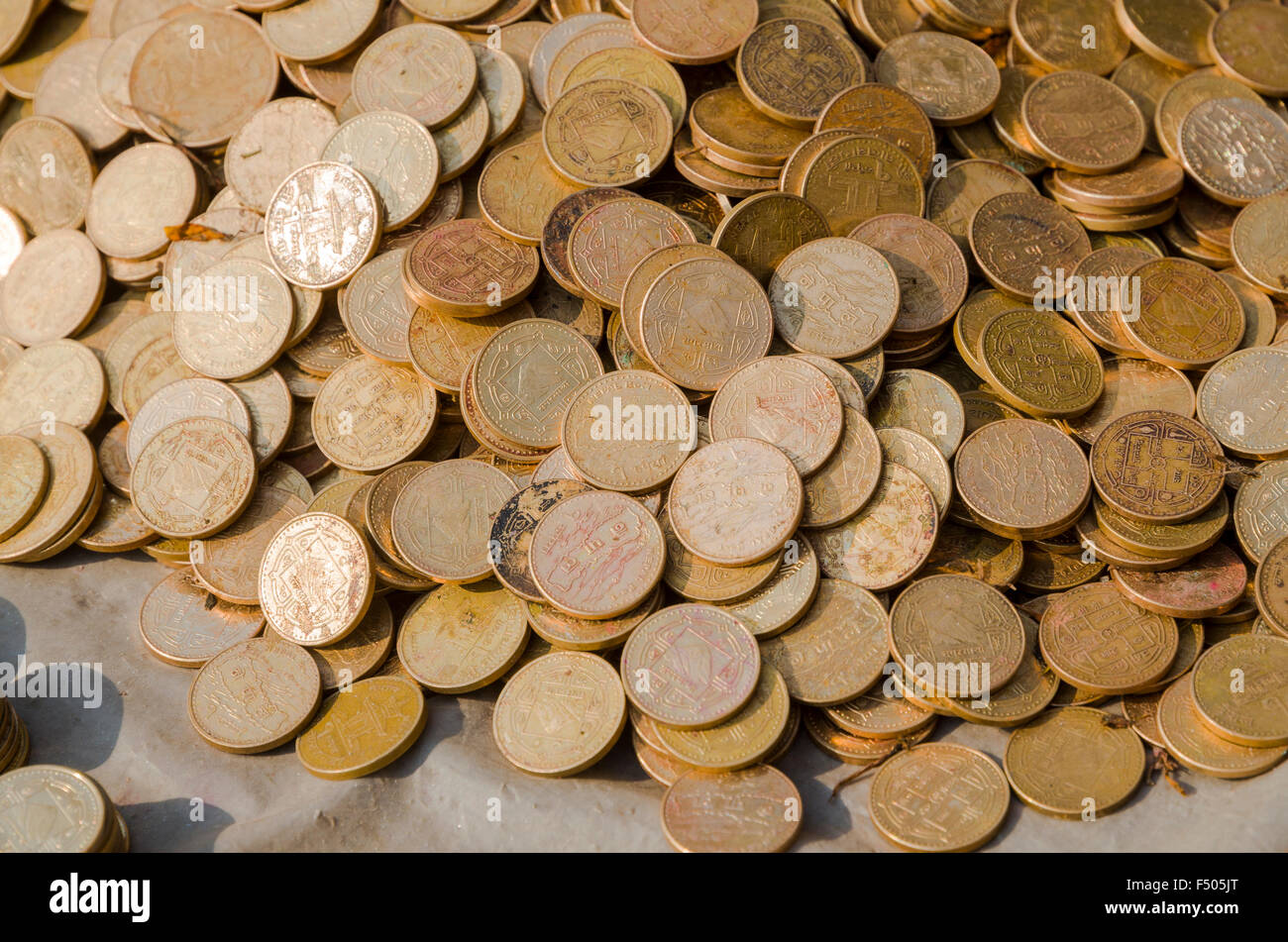 Many nepali coins piling up Stock Photo