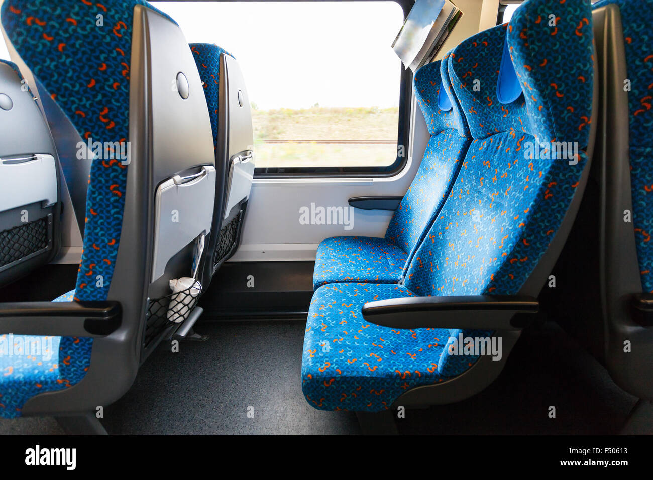 empty seats in railway wagon in second class Stock Photo