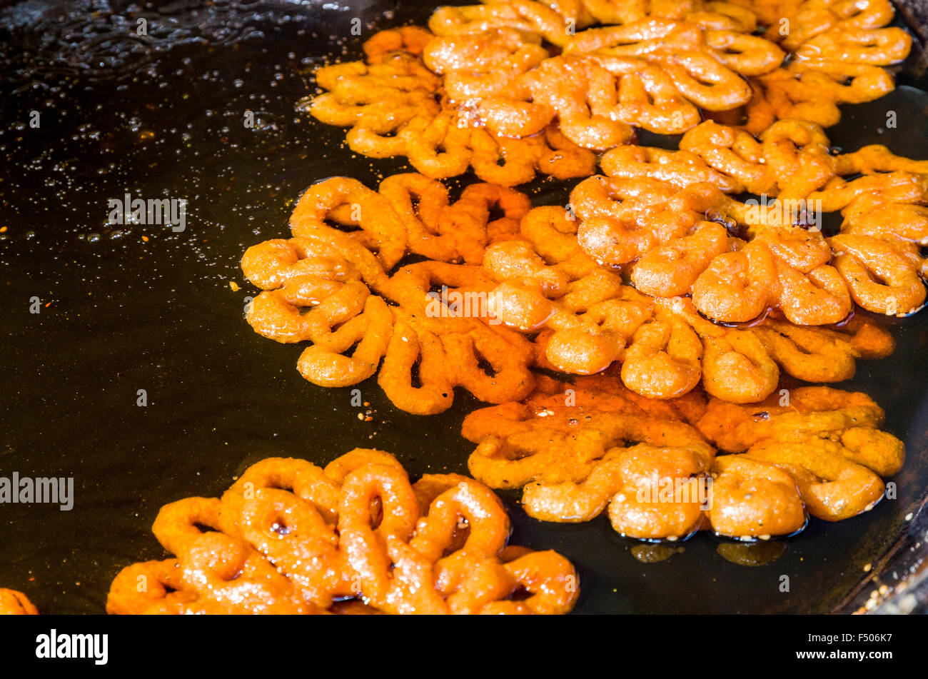 Pan with frying sweet bread Stock Photo - Alamy