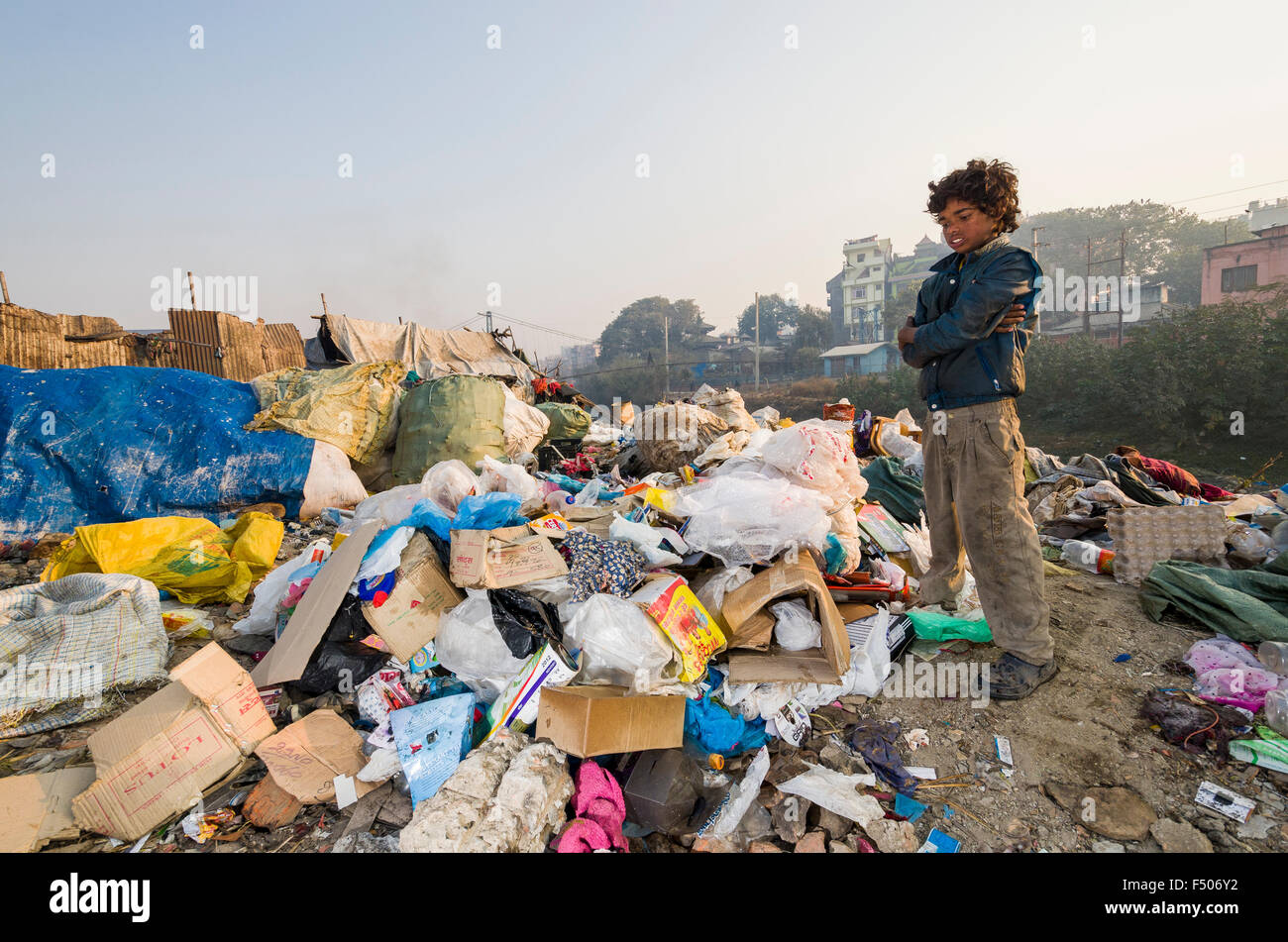 Children live, play and work on the garbage dump at Bhagmati River in