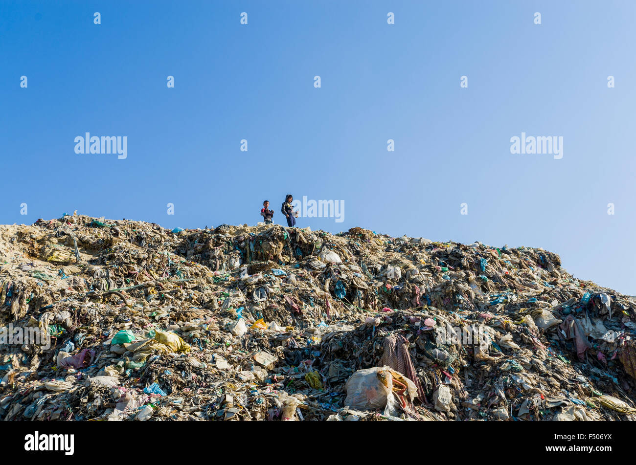 Children live, play and work on the garbage dump at Aletar garbage dump Stock Photo