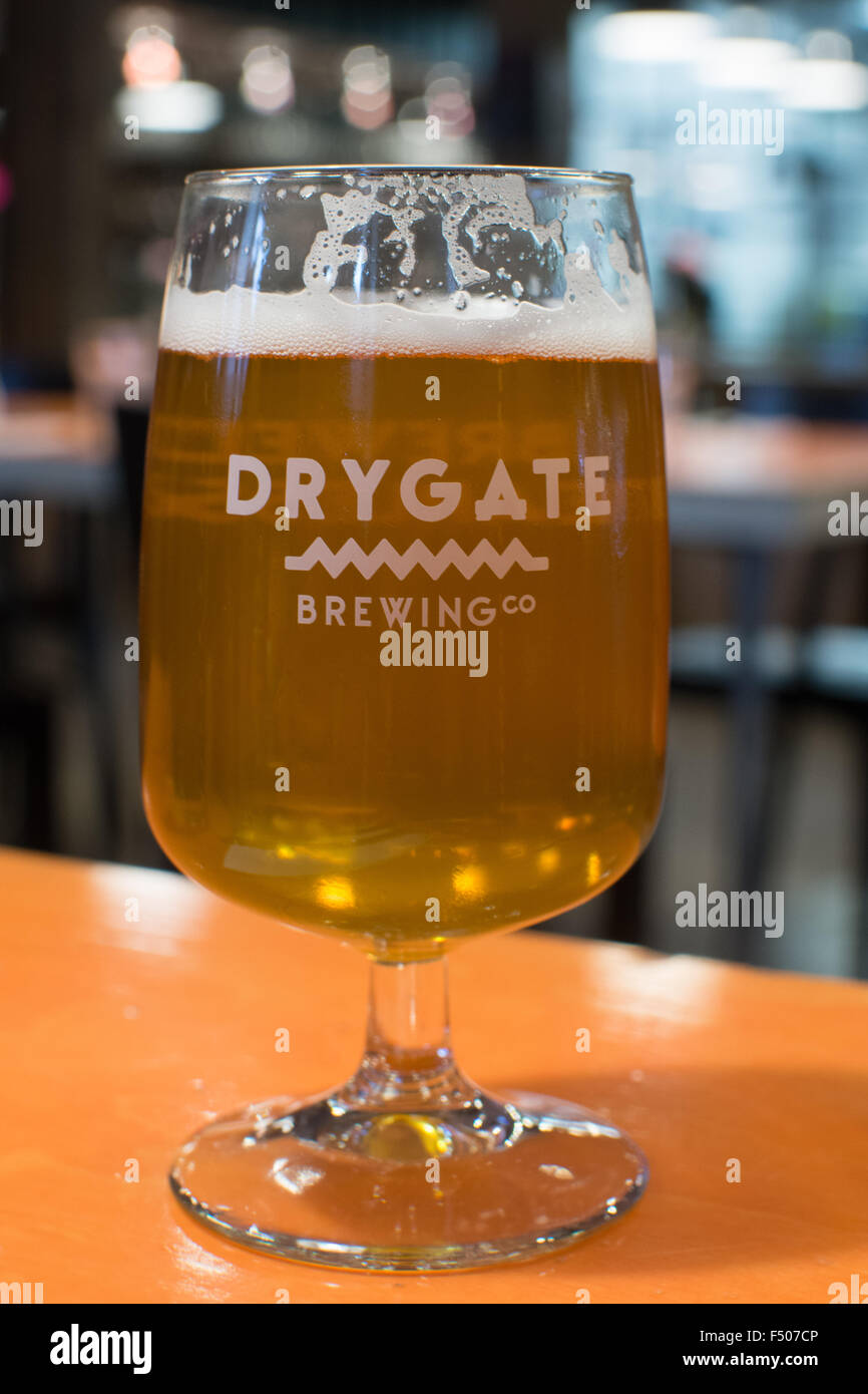 glass of Outaspace Apple Ale brewed and served at Drygate Brewing Co - a craft brewery in Glasgow, Scotland, UK Stock Photo