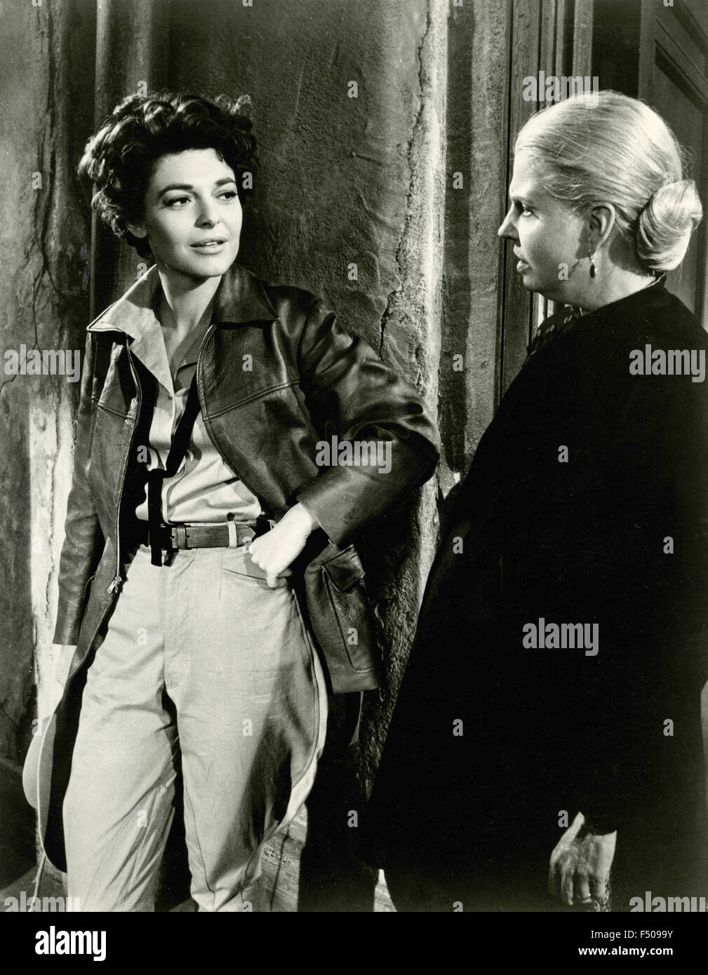American actress Anne Bancroft and Betty Field in the movie '7 Women' Stock Photo