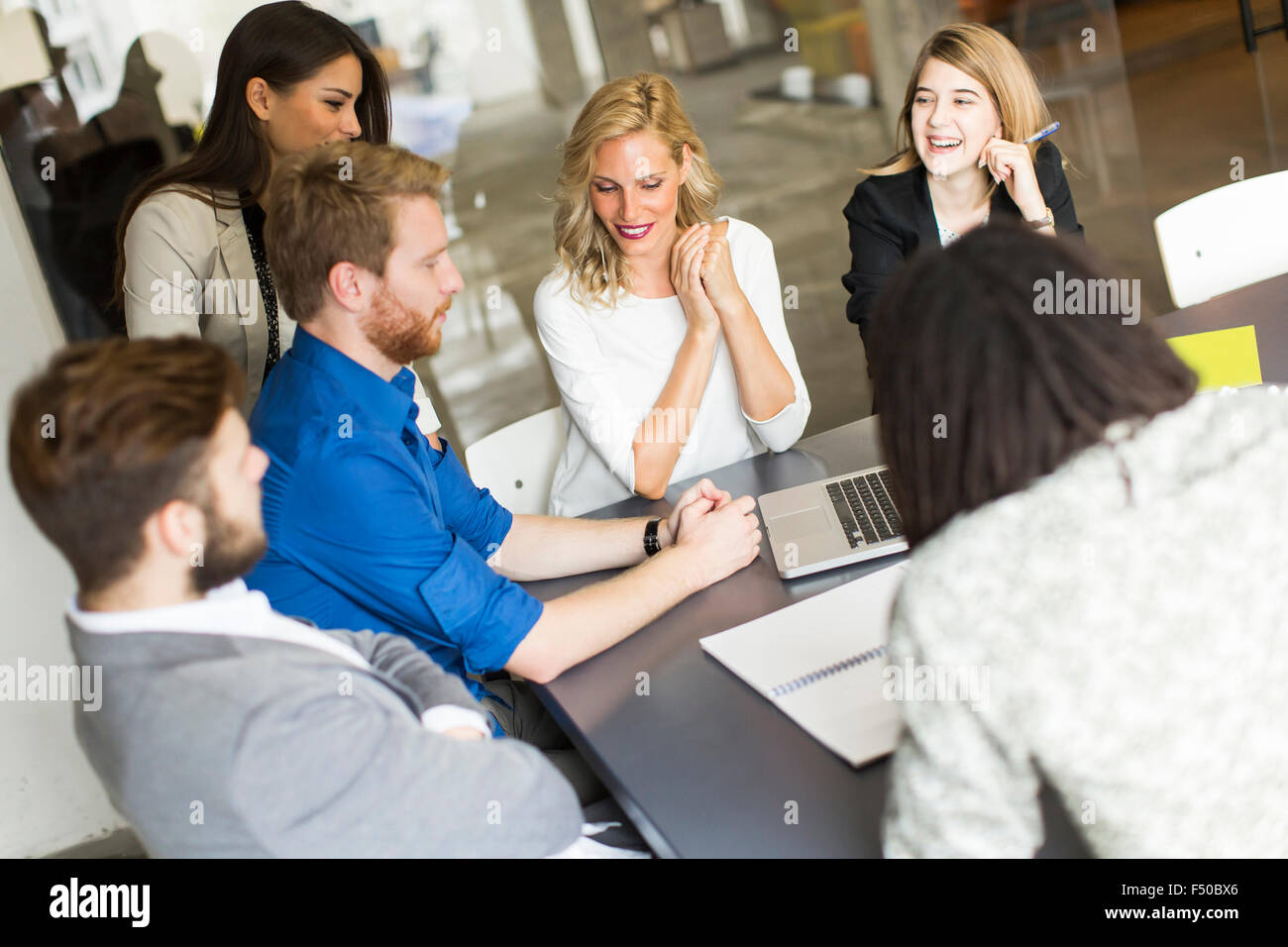 Young people in the office Stock Photo - Alamy