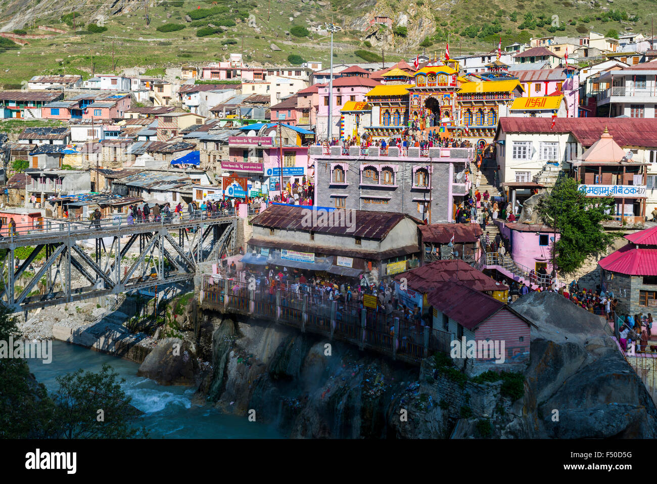 The colorful Badrinath Temple, one of the Dschar Dham destinations, is located in the middle of town Stock Photo