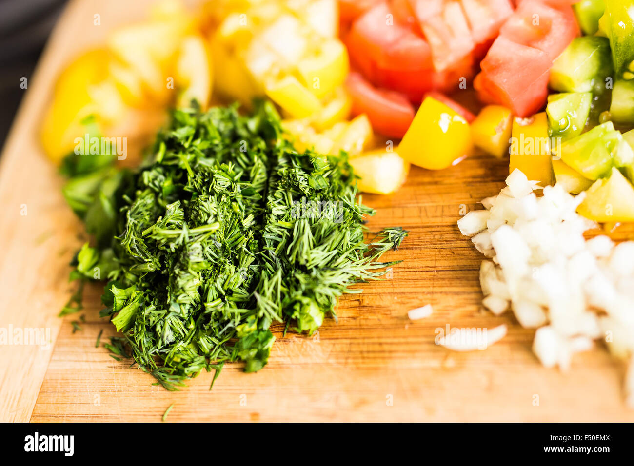 fresh chopped vegetables on a cutting  board Stock Photo