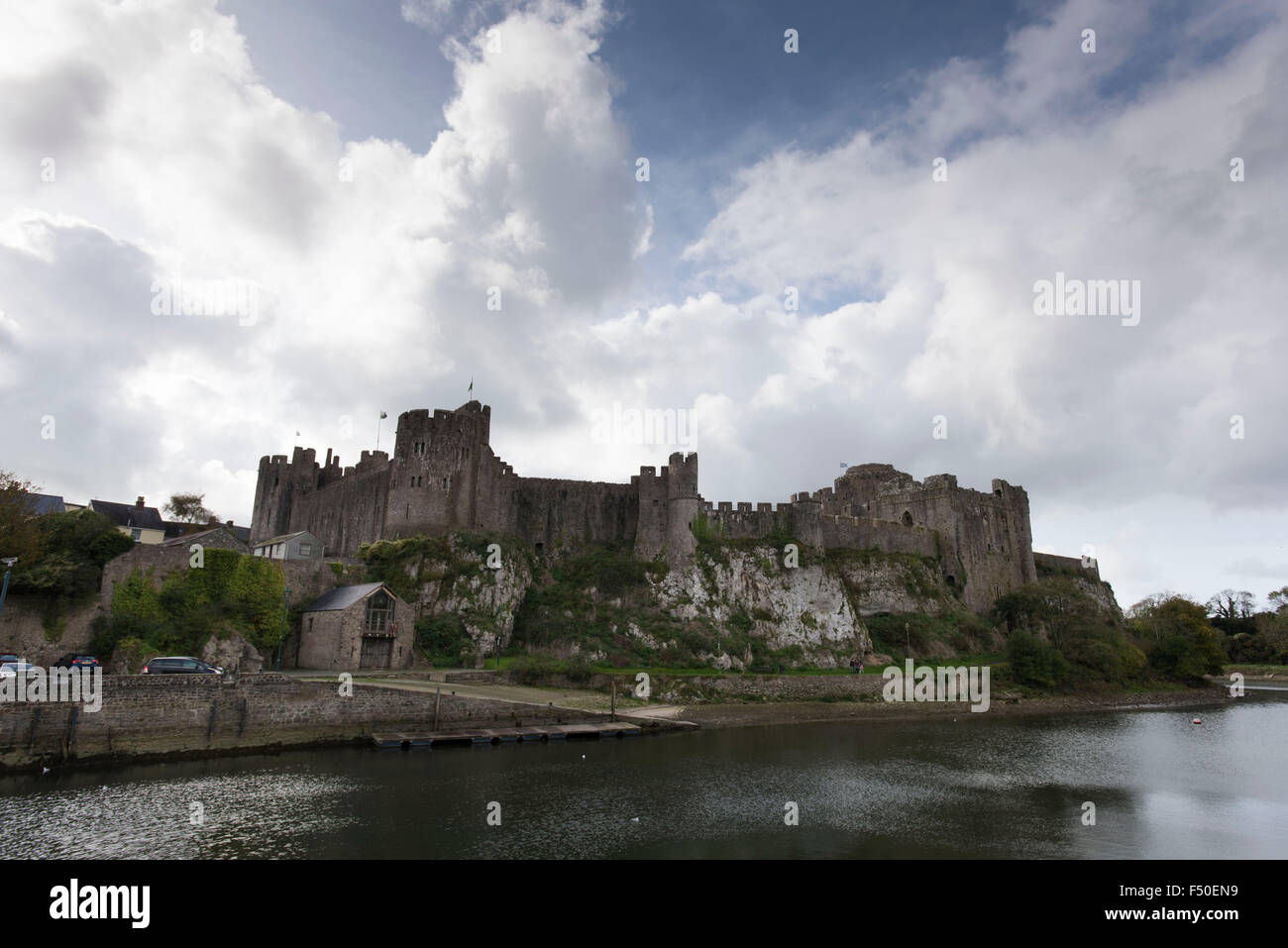 Mill Pond which surrounds Pembroke Castle n Pembroke, West Wales. Three people died in the pond in 2015. Stock Photo